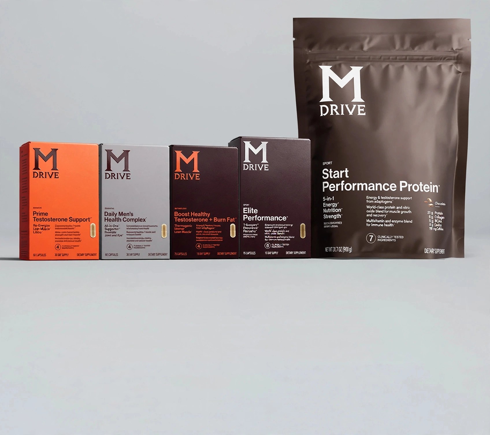 M Drive boxes and protein pouch arranged on light background.